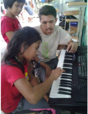 Music in a Cart Dianne starting keyboard lessons March 2015