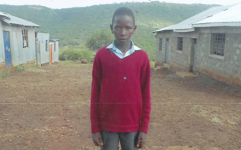 Enock Pariken Jan 2016 outside his school in Kisamis, Kenya