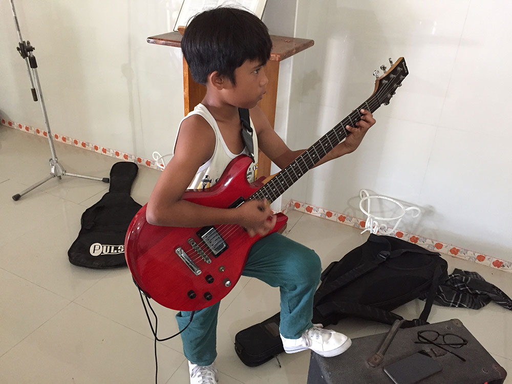 CJ Talan playing guitar - SIAC - Nov4 2019